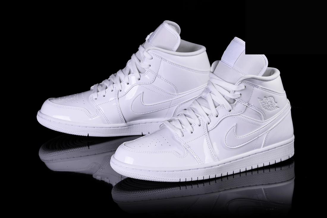 Фото № 1 с приближением к товару «‎Nike Air Jordan 1 Retro Wmns Triple»