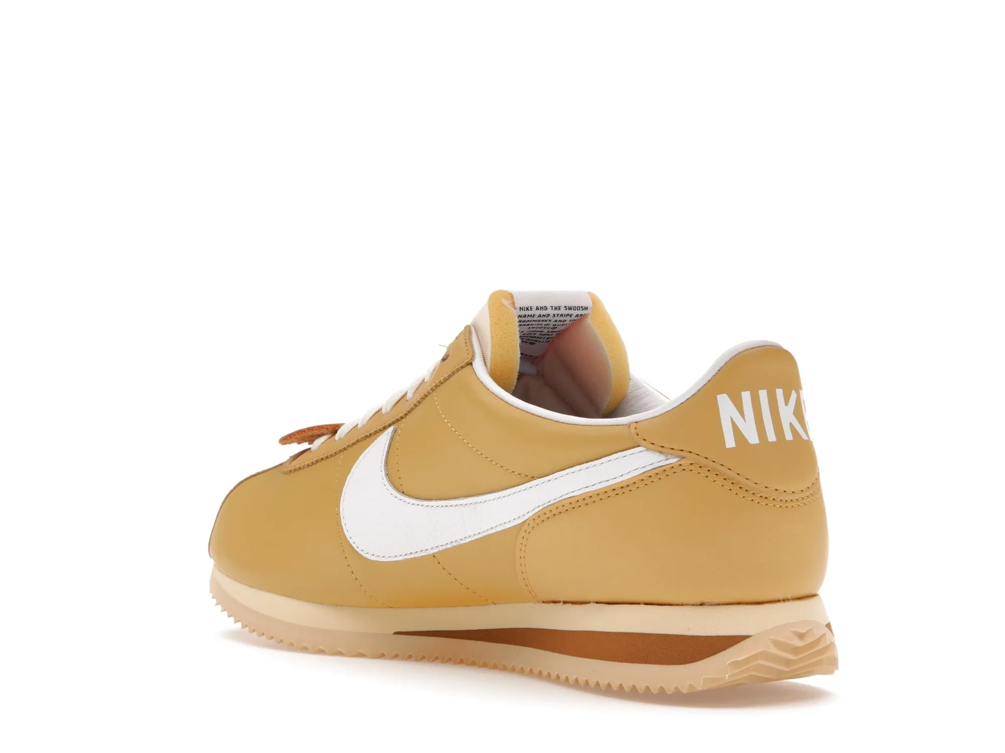 Nike cortez 2024 gold tick