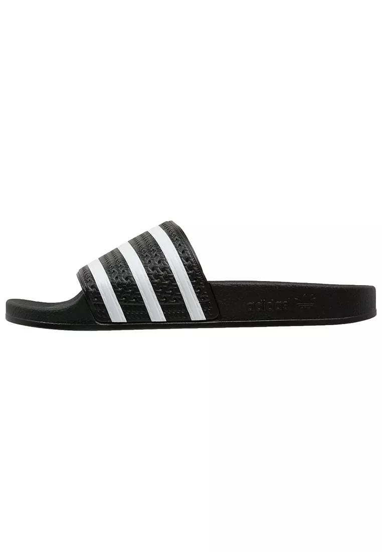 Фото № 1 с приближением к товару «‎ADILETTE UNISEX»