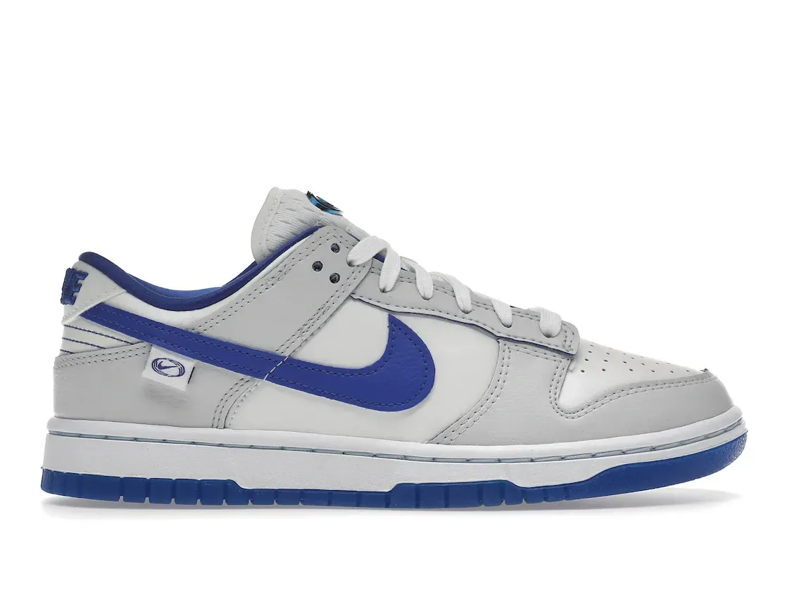 Фото № 1 с приближением к товару «‎Nike Dunk Low Worldwide White Blue »