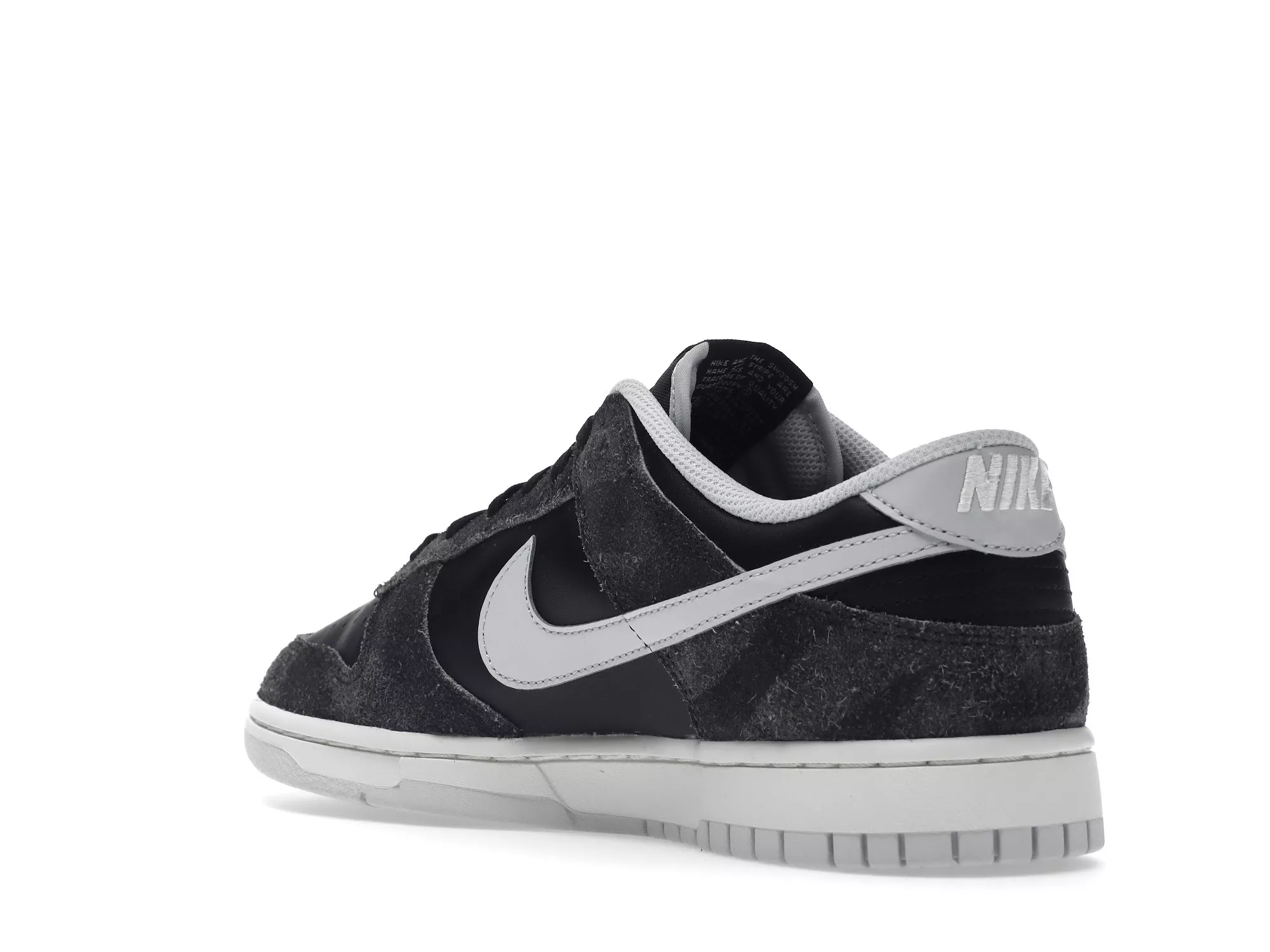 Фото № 4 с приближением к товару «‎Nike Dunk Low Retro Animal Pack Zebra»