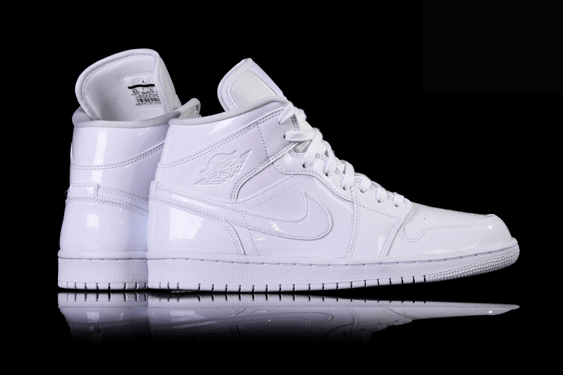 Фото № 3 с приближением к товару «‎Nike Air Jordan 1 Retro Wmns Triple»