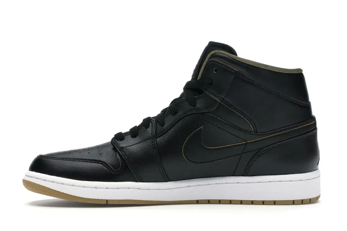 Фото № 3 с приближением к товару «‎Jordan 1 Retro Mid Black Metallic Gold»