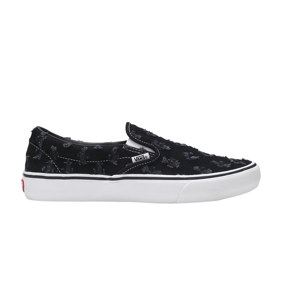 Фото № 1 с приближением к товару «‎Supreme x Vans Slip-On Black Hole Punch Denim»
