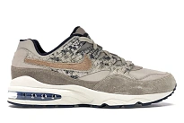 Фото № 1 с приближением к товару «‎Nike Air Max 94 Snakeskin Newsprint»