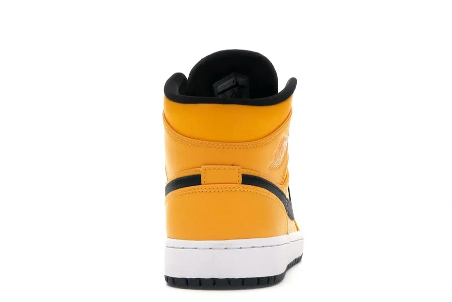 Фото № 4 с приближением к товару «‎Jordan 1 Mid University Gold Black»
