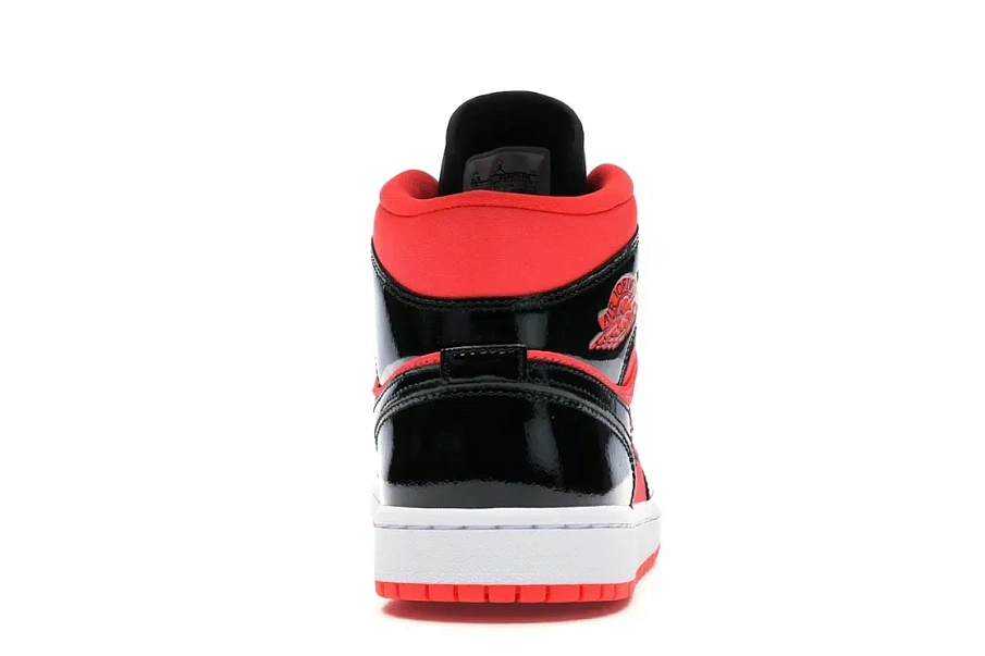 Фото № 4 с приближением к товару «‎Jordan 1 Mid Hot Punch Black »