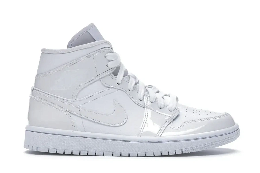 Фото № 1 с приближением к товару «‎Jordan 1 Mid Triple White Patent Swoosh »
