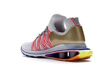 Фото № 6 с приближением к товару «‎Nike Shox Gravity Vast Grey Metallic Gold»