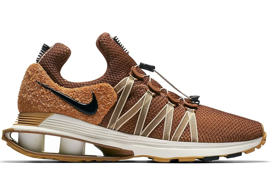 Фото № 1 с приближением к товару «‎Nike Shox Gravity Elemental Gold»