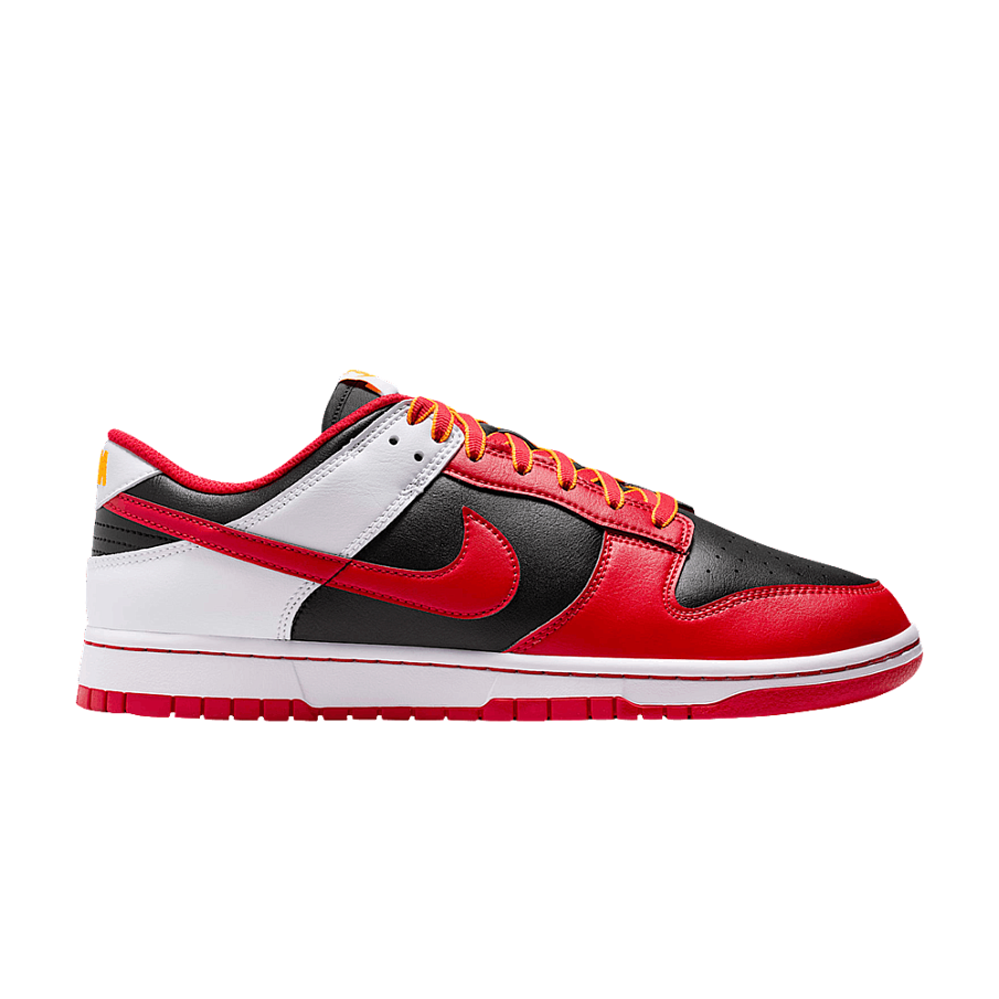 Фото № 1 с приближением к товару «‎Nike Dunk Low Retro Black White University Gold»