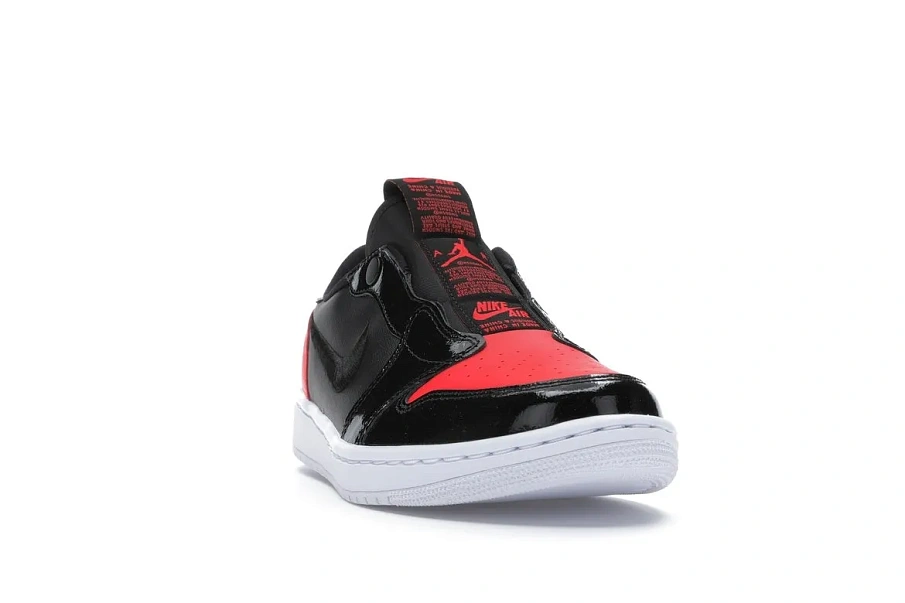 Фото № 3 с приближением к товару «‎Jordan 1 Low Slip Black Hot Punch »