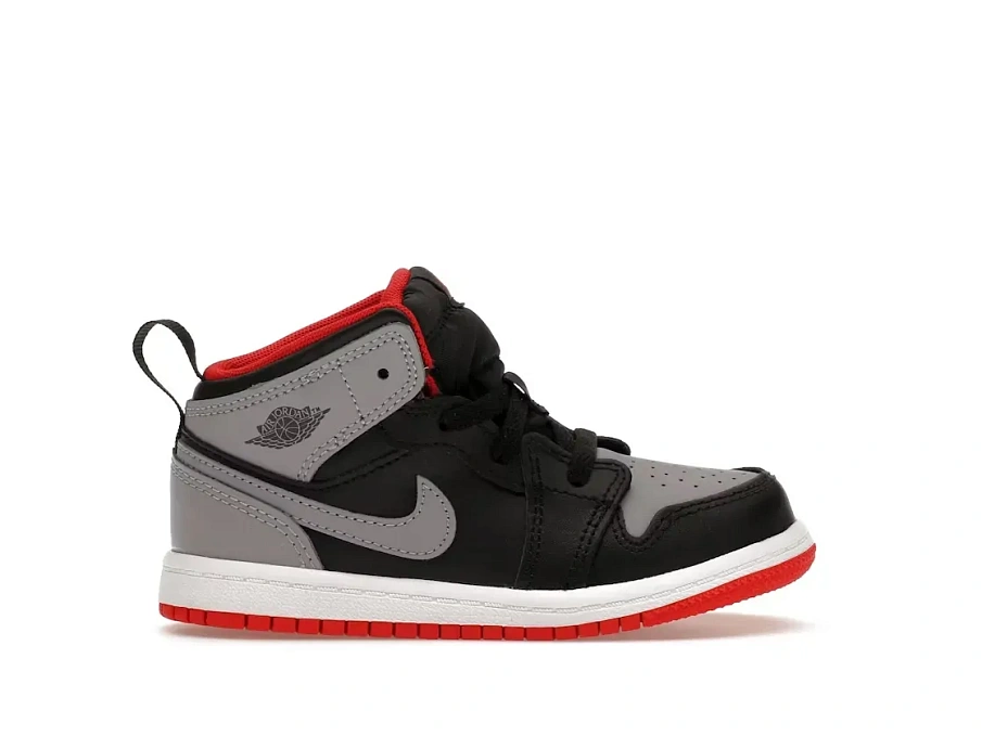 Фото № 1 с приближением к товару «‎Jordan 1 Mid»