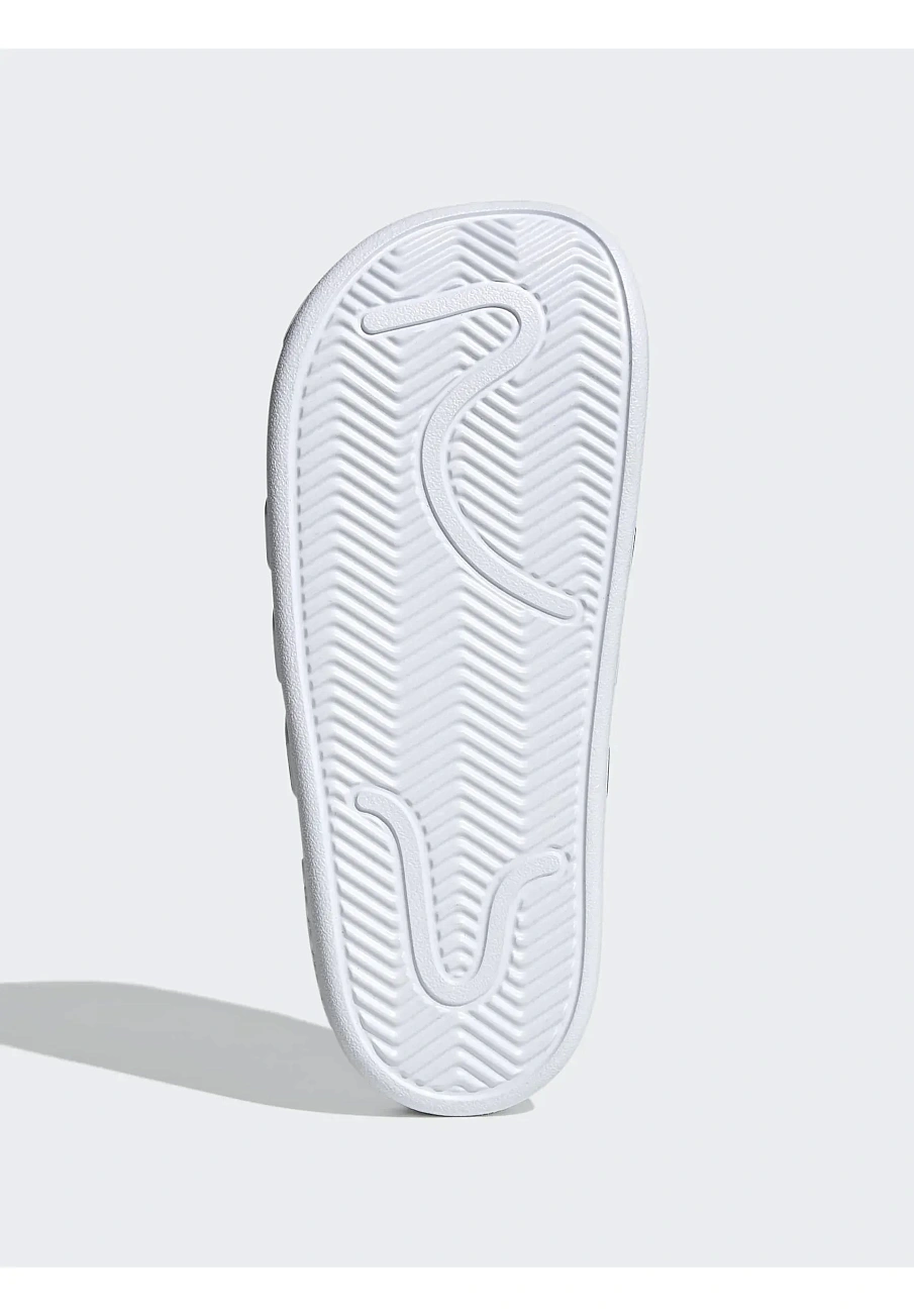 Фото № 4 с приближением к товару «‎ADILETTE »