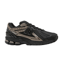 Фото № 1 с приближением к товару «‎New Balance 1906R Black Gold»