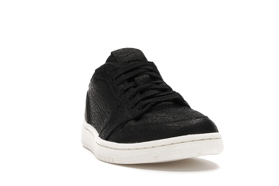 Фото № 2 с приближением к товару «‎Jordan 1 Retro Low Swooshless Black»