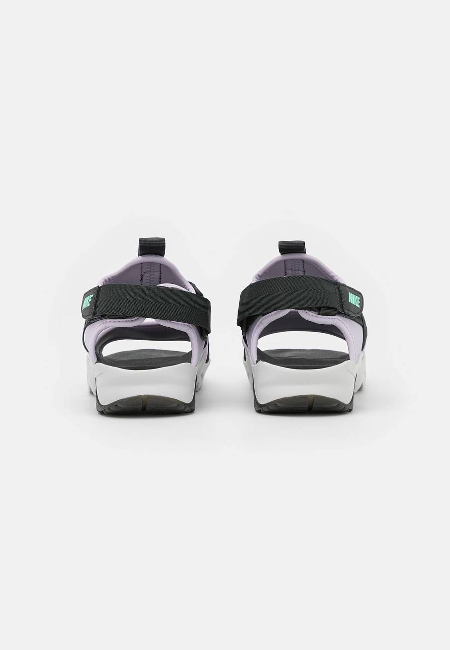 Фото № 4 с приближением к товару «‎Nike Canyon Slide»