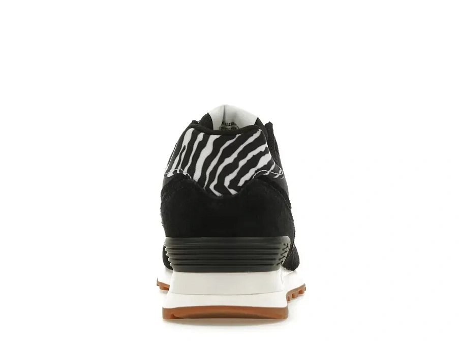 Фото № 4 с приближением к товару «‎New Balance 574»