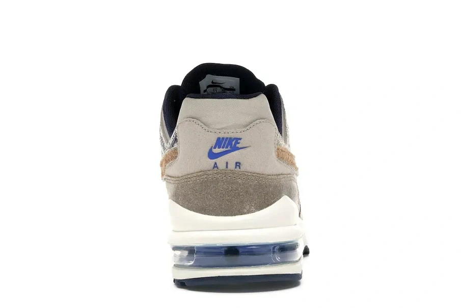 Фото № 4 с приближением к товару «‎Nike Air Max 94 Snakeskin Newsprint»