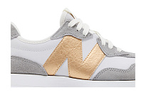 Фото № 3 с приближением к товару «‎New Balance Women's 327 Gold Metallic»