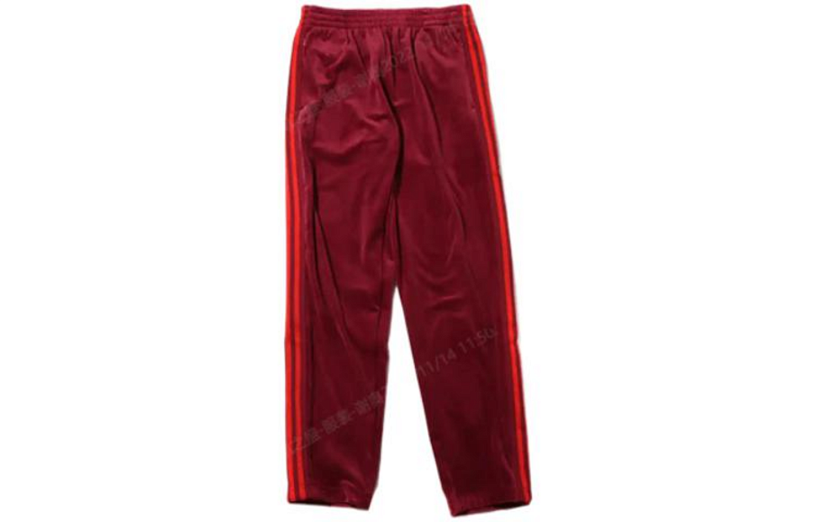 Фото № 1 с приближением к товару «‎adidas x IVY PARK Mens Stripe Sports Trousers Red»