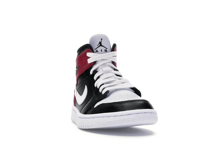 Фото № 4 с приближением к товару «‎Jordan 1 Mid Black Noble Red »